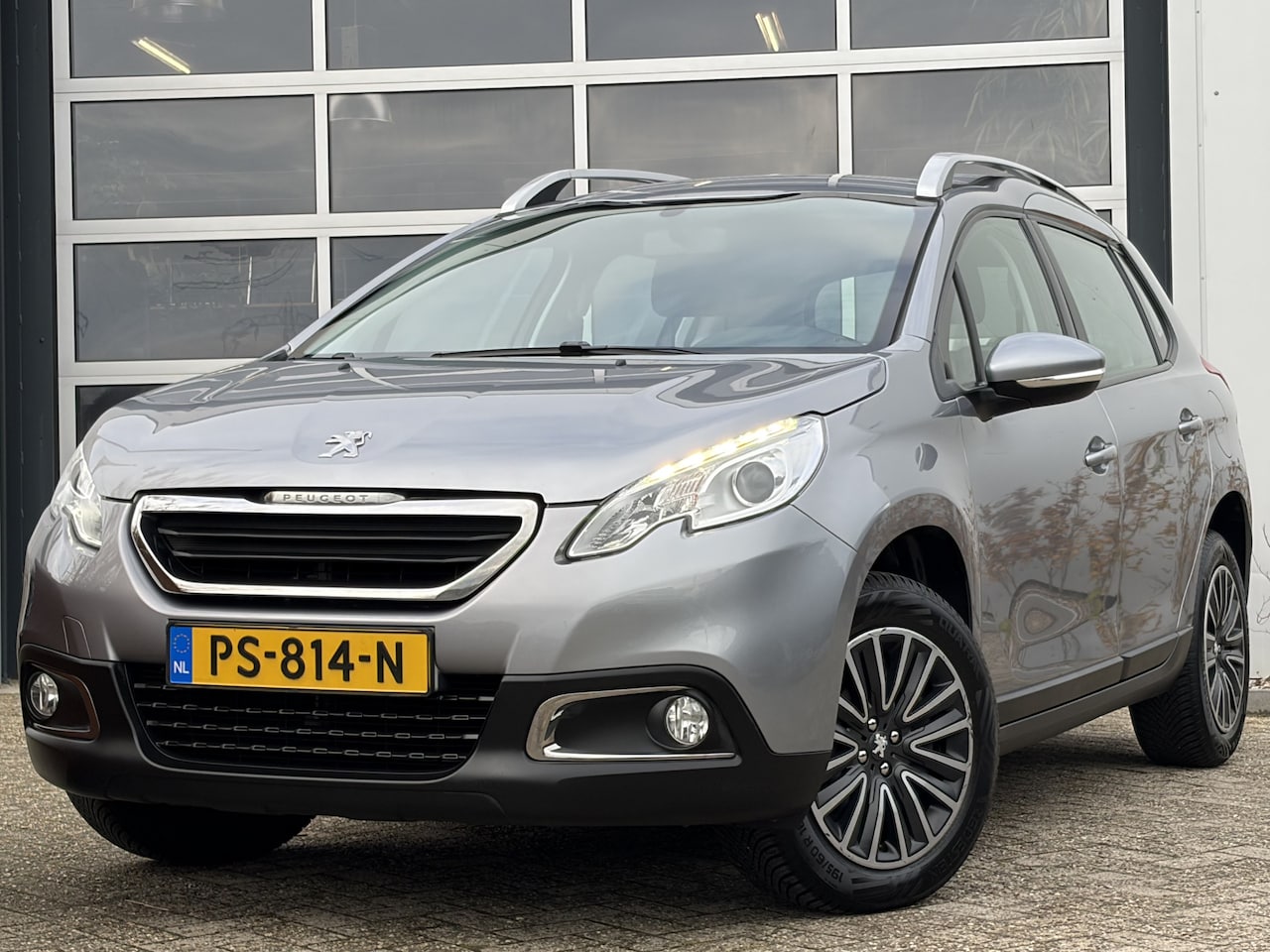 Peugeot 2008 - 1.2 PureTech Active 82pk | Airco | Bluetooth | Cruise control | Elektrische ramen voor | L - AutoWereld.nl
