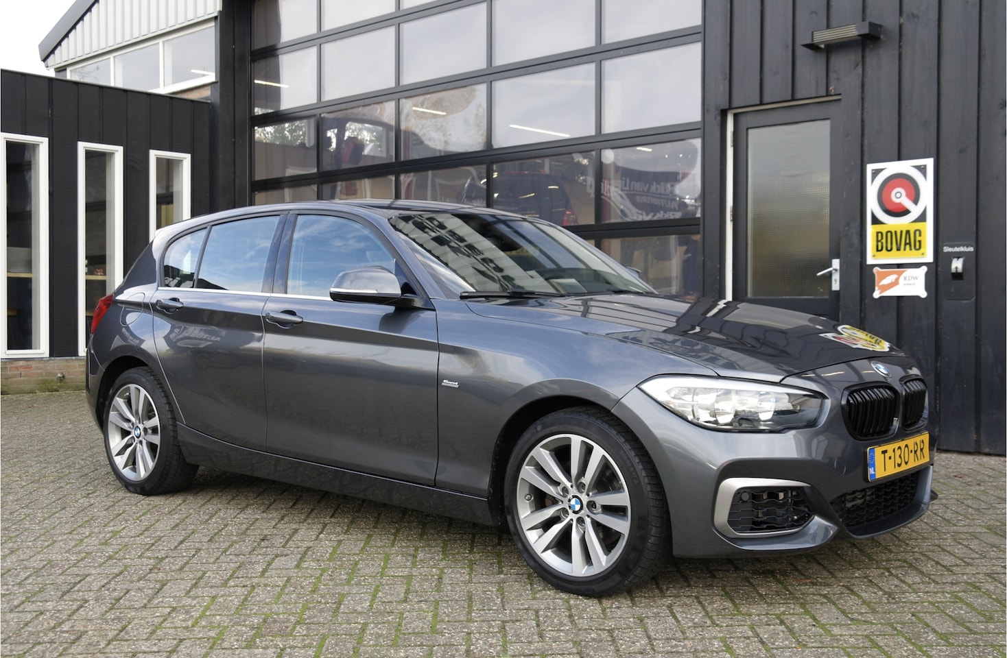 BMW 1-serie - 125i 218 PK M Sport | Cruise | Clima | Navi - AutoWereld.nl