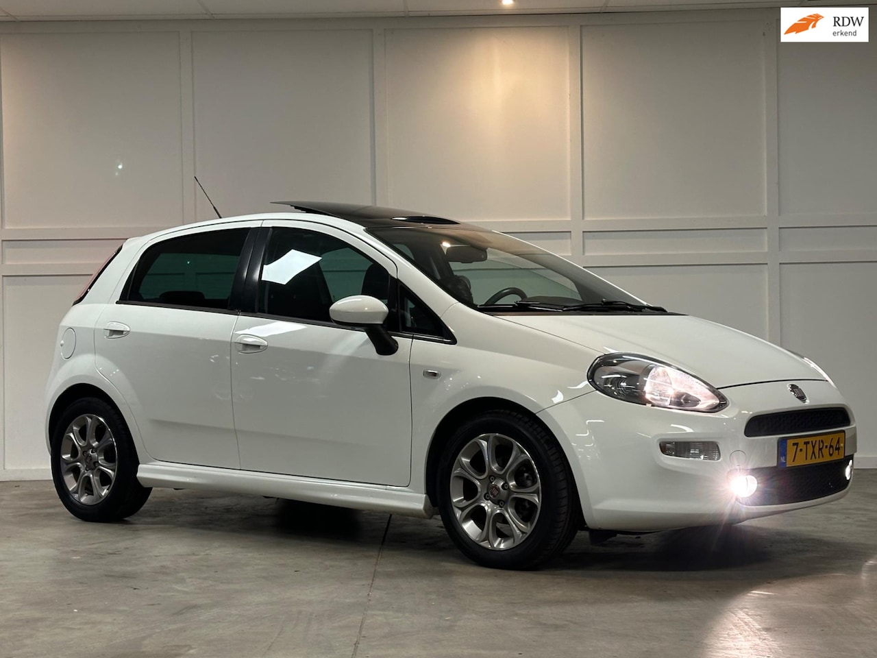 Fiat Punto Evo - TwinAir / Panorama / Cruise / Lounge / 2014 / Airco - AutoWereld.nl