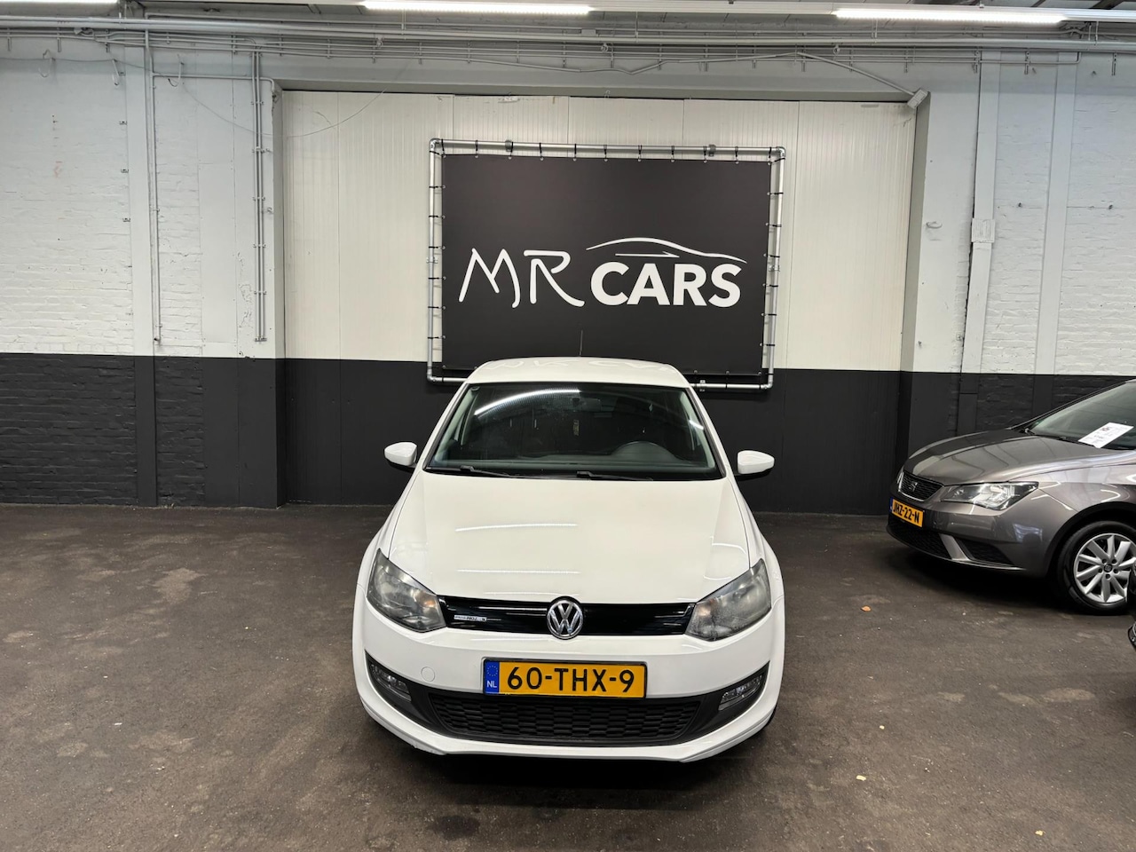 Volkswagen Polo - 1.2 TDI BlueMotion Comfortline Navi/Airco/Cruise Control - AutoWereld.nl
