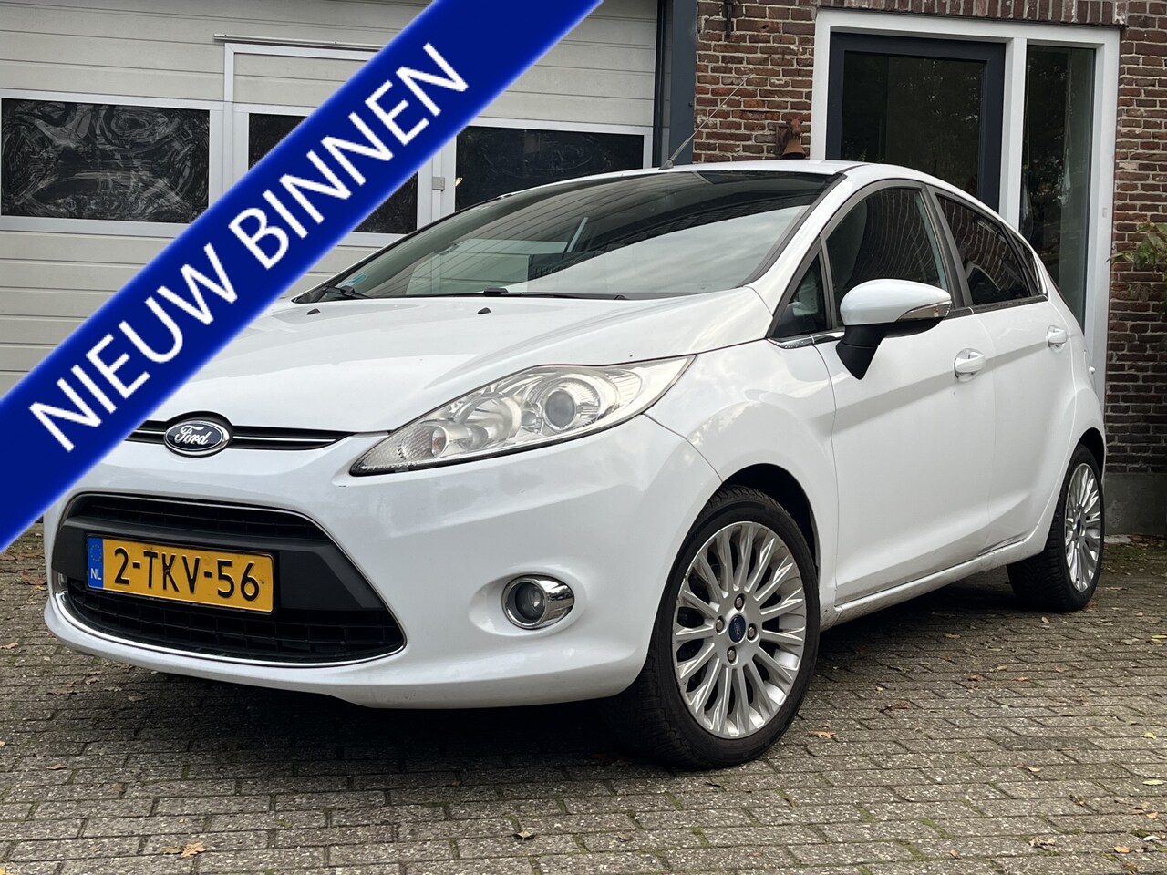 Ford Fiesta - 1.25 Titanium '12 Clima Navi Carplay - AutoWereld.nl