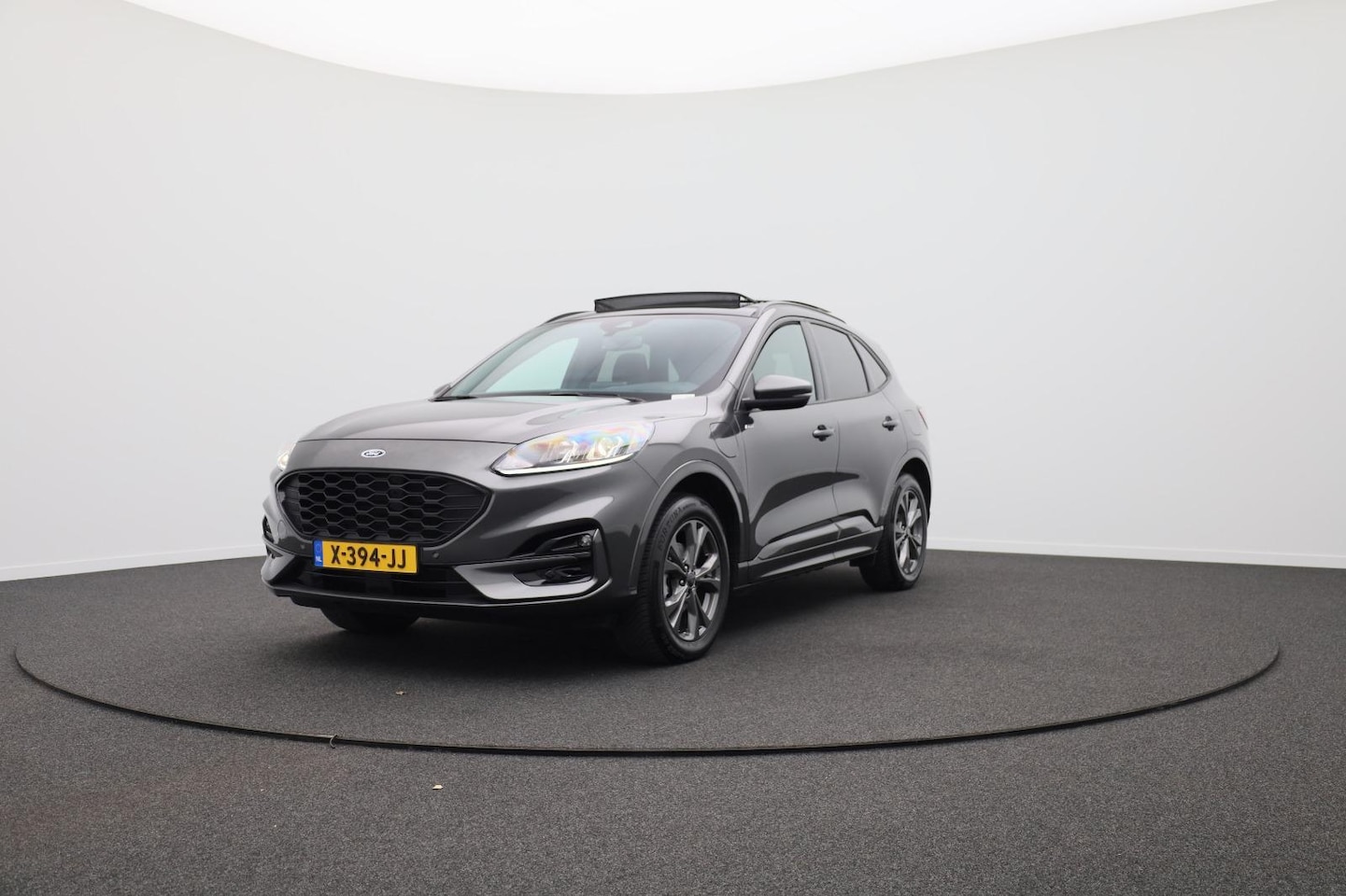 Ford Kuga - 2.5 PHEV ST-Line 225PK I PANORAMADAK I ALL-SEASON I TREKHAAK - AutoWereld.nl
