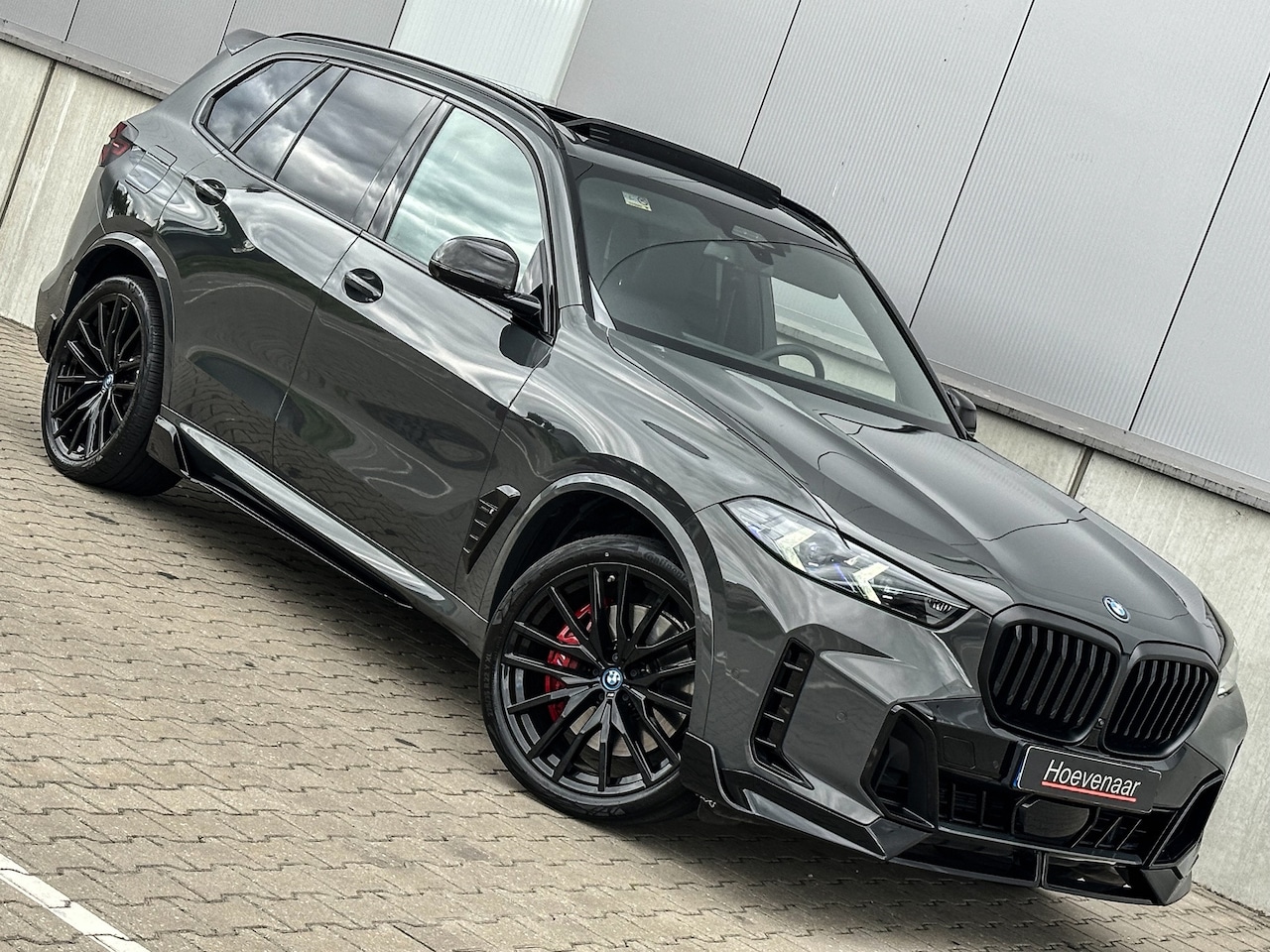 BMW X5 - 50e 490Pk M-sport Performance Dravitgrau Full option - AutoWereld.nl