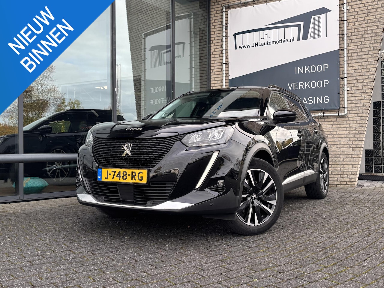 Peugeot e-2008 - EV Allure 50 kWh*3FASE*ACC*NAVI*ECC*CARPLAY* - AutoWereld.nl