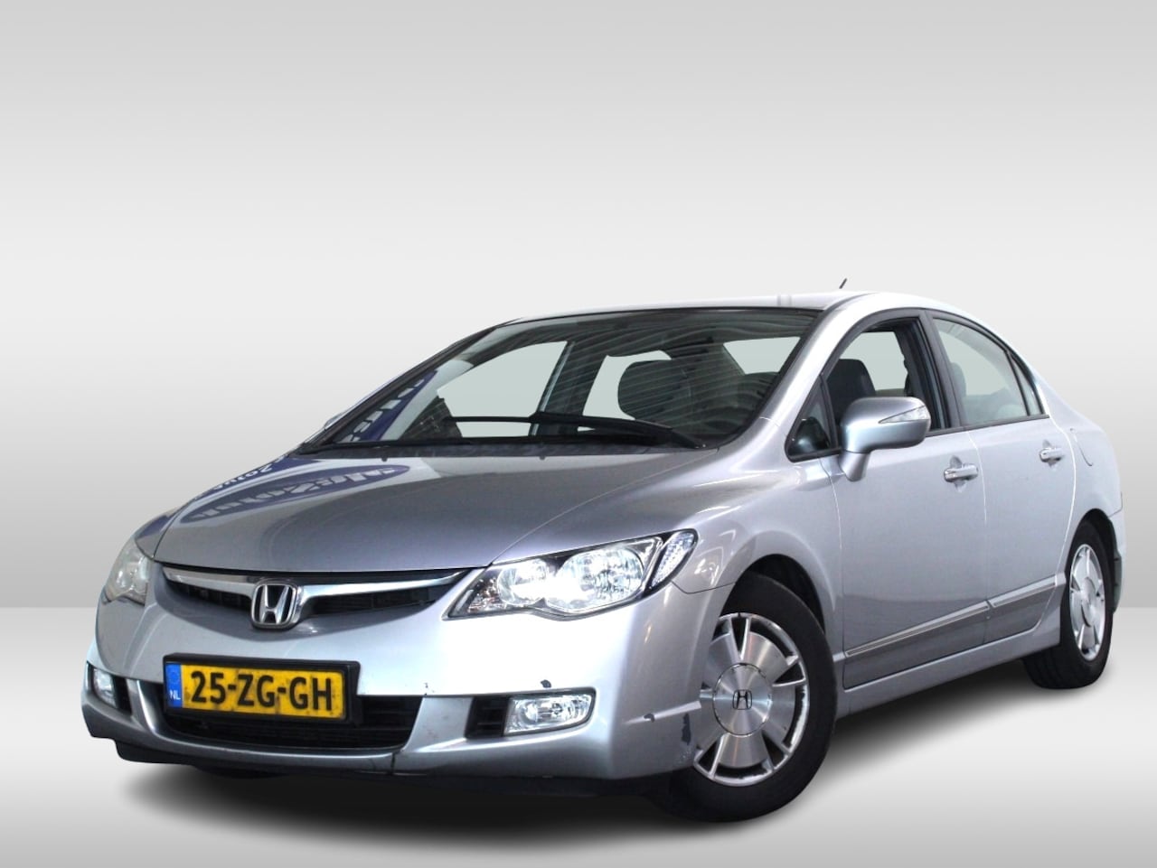 Honda Civic - 1.3 Hybrid NAP APK-3/2026 ECC BT CRUIS STOELVW TRKHK '08 - AutoWereld.nl