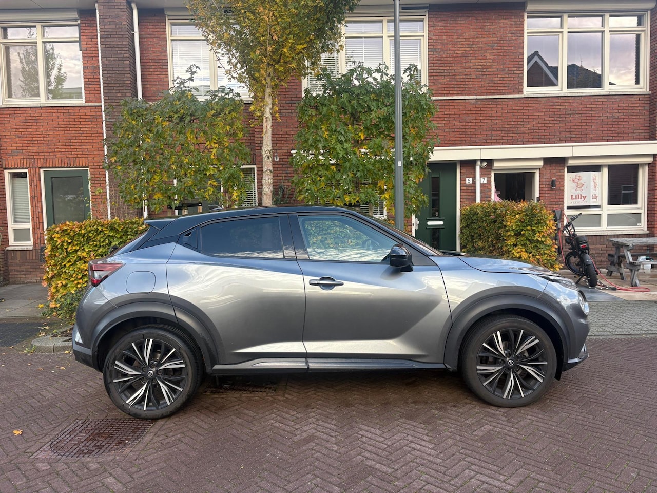 Nissan Juke - 1.0 DIG-T N-Design Aut. Nav. 360cam Leer - AutoWereld.nl