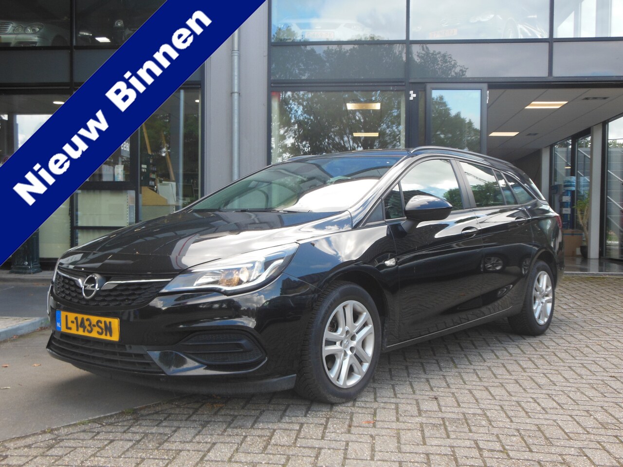 Opel Astra Sports Tourer - 1.2 Edition Staat in De Krim - AutoWereld.nl