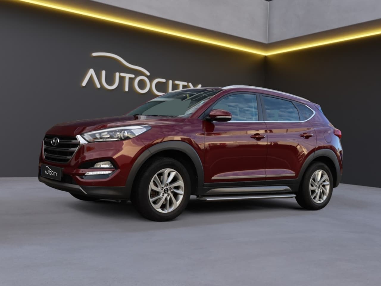 Hyundai Tucson - 1.6 GDi Comfort Camera l Navi l Cruise - AutoWereld.nl