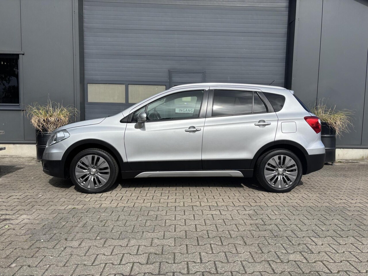 Suzuki SX4 S-Cross - 1.6 Exclusive Automatische Airco/ Cruise Control/ Bluetooth/ afneembare trekhaak.