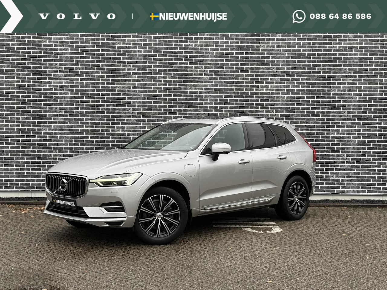 Volvo XC60 - 2.0 T8 Twin Engine AWD Inscription | Trekhaak | Lederen bekleding | Adaptive cruise contro - AutoWereld.nl