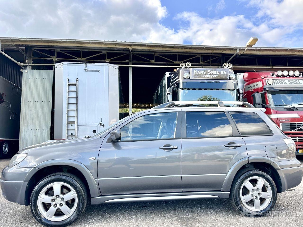 Mitsubishi Outlander - gereserveerd 2.0 Turbo 201pk 4WD - uniek - 2x schuifdak - airco - leer + alcantara + stoel - AutoWereld.nl