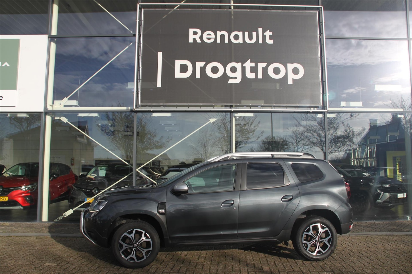Dacia Duster - 110PK-BI FUEL/LPG-PRESTIGE-95DKM-LEDER-NAVI-TREKH- - AutoWereld.nl
