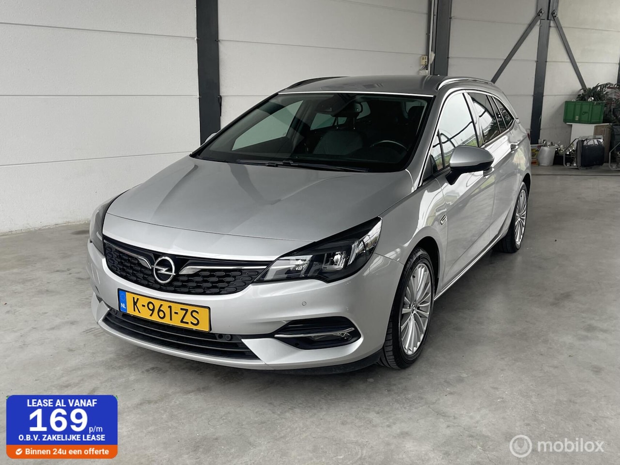 Opel Astra Sports Tourer - 1.2 Business Elegance 1.2 Business Elegance - AutoWereld.nl
