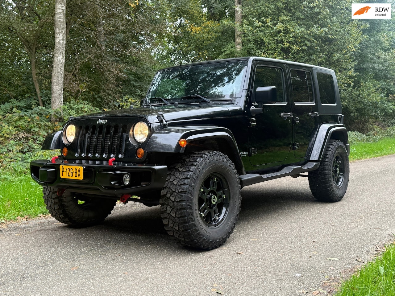 Jeep Wrangler Unlimited - 2.8 CRD Sport / 5-deurs / Airco / Trekhaak / Cruise - AutoWereld.nl
