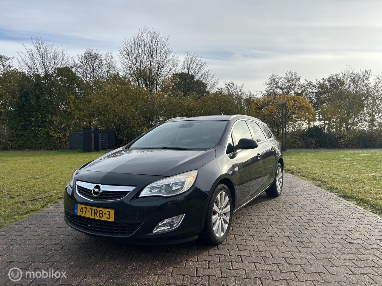Opel Astra Sports Tourer - 1.4 Cosmo 1.4 Cosmo - AutoWereld.nl