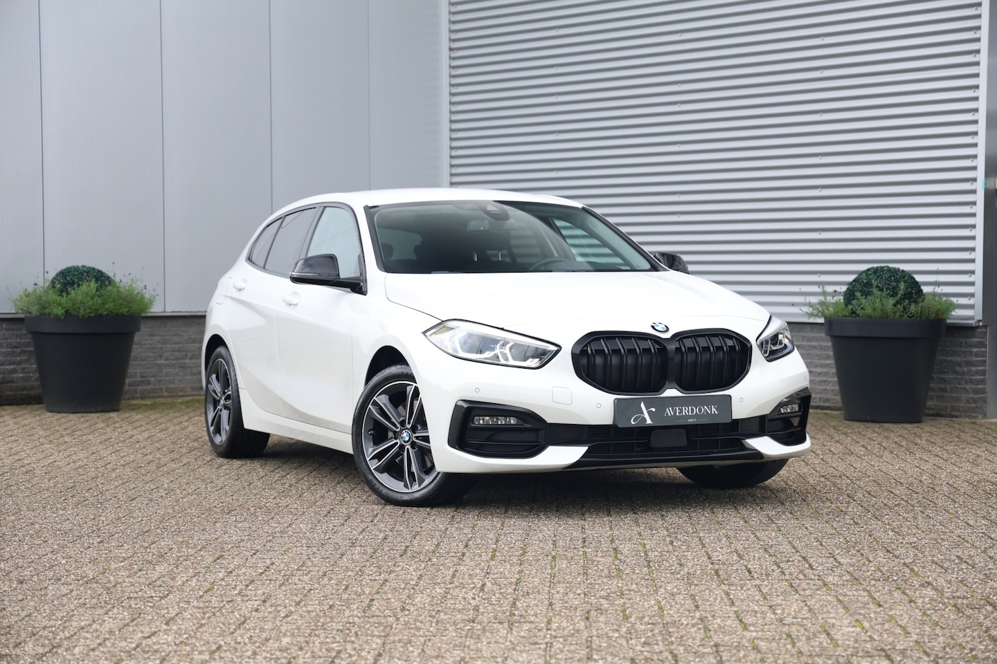 BMW 1-serie - 118i Executive Sportline Aut. NAP|Sportst|Sfeervl|Carplay - AutoWereld.nl