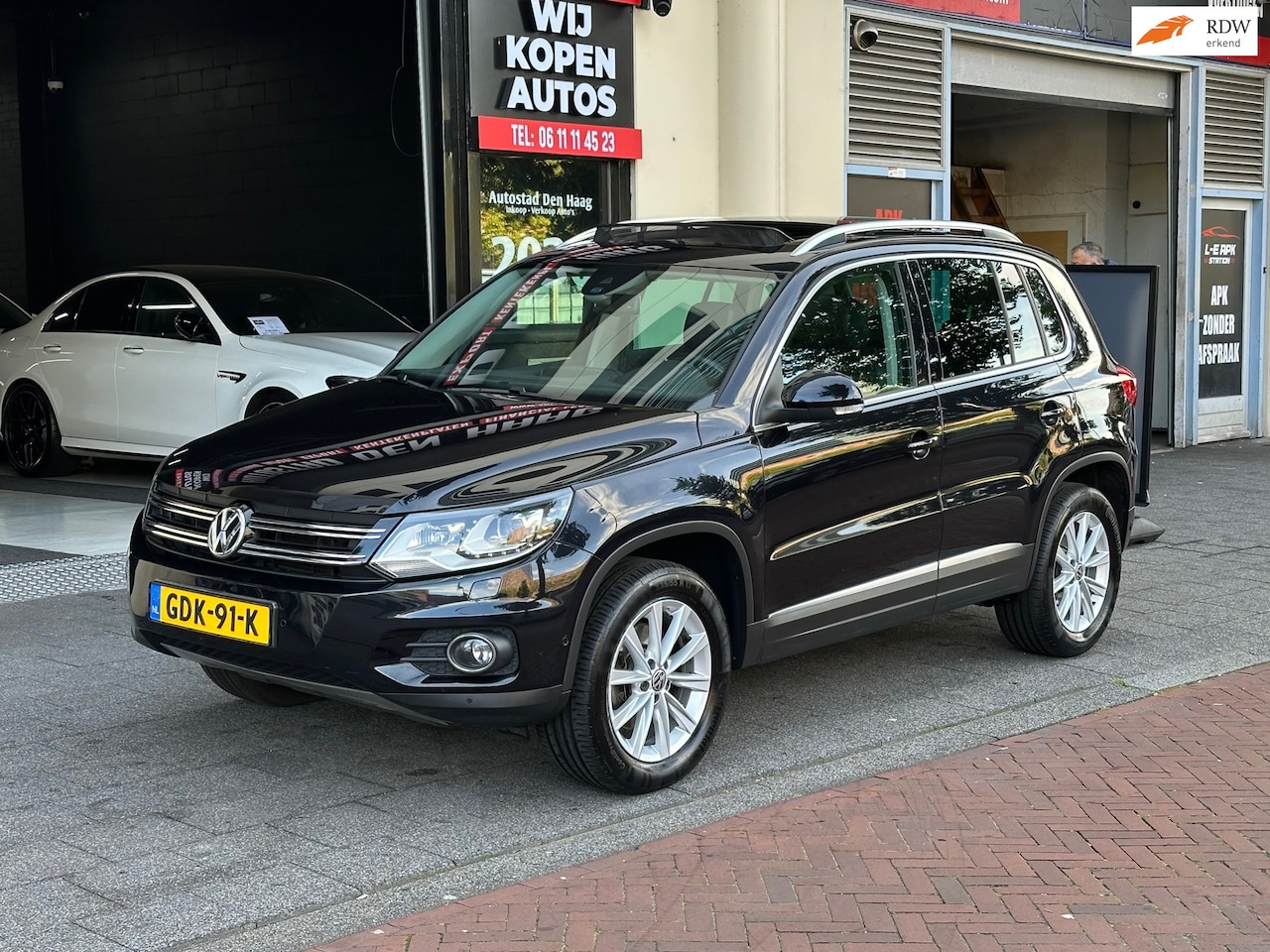 Volkswagen Tiguan - 2.0 TSI Sport&Style 4Motion Automaat Leer Navi Pano - AutoWereld.nl
