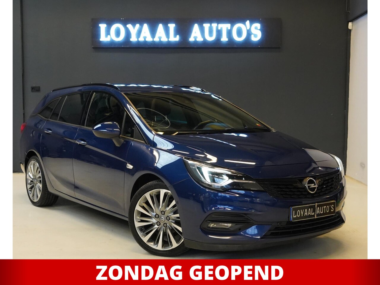 Opel Astra Sports Tourer - 1.2 Launch Edition | NAVI | CRUISE | AIRCO | STOELVERW | PDC | APK | NAP. - AutoWereld.nl