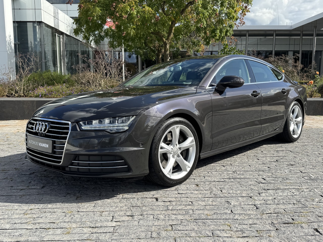 Audi A7 Sportback - 3.0 TFSI quattro / Luchtvering / Soft-close / Head-up display - AutoWereld.nl