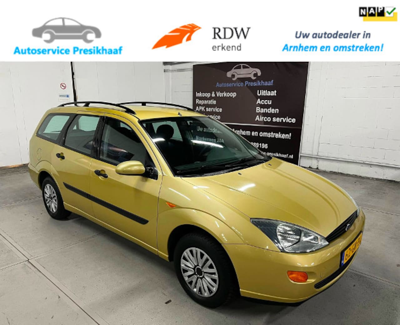 Ford Focus Wagon - 1.4-16V Ambiente AIRCO / NAP / TREKHAAK - AutoWereld.nl