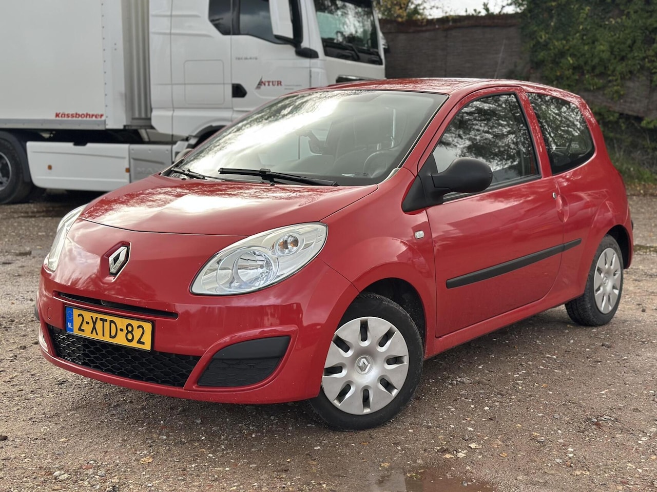 Renault Twingo - 1.2 Night & Day 2XSLEU/ ELEKPAKKET/ TREKHAAK - AutoWereld.nl