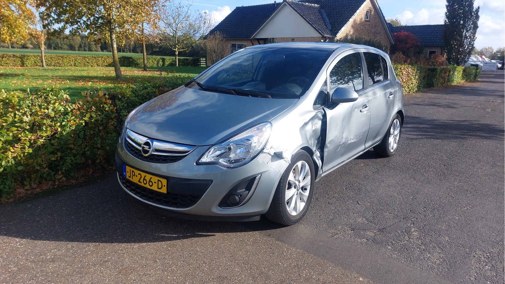 Opel Corsa - 1.4-16V Anniversary Edition AIRCO BJ 2012 - AutoWereld.nl