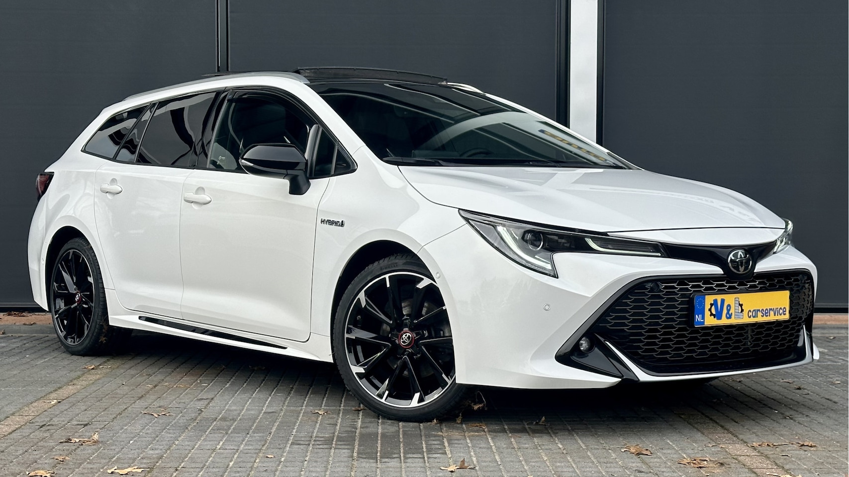 Toyota Corolla Touring Sports - 2.0 Hybrid Business GR-Sport / Pano / HUD / JBL - AutoWereld.nl