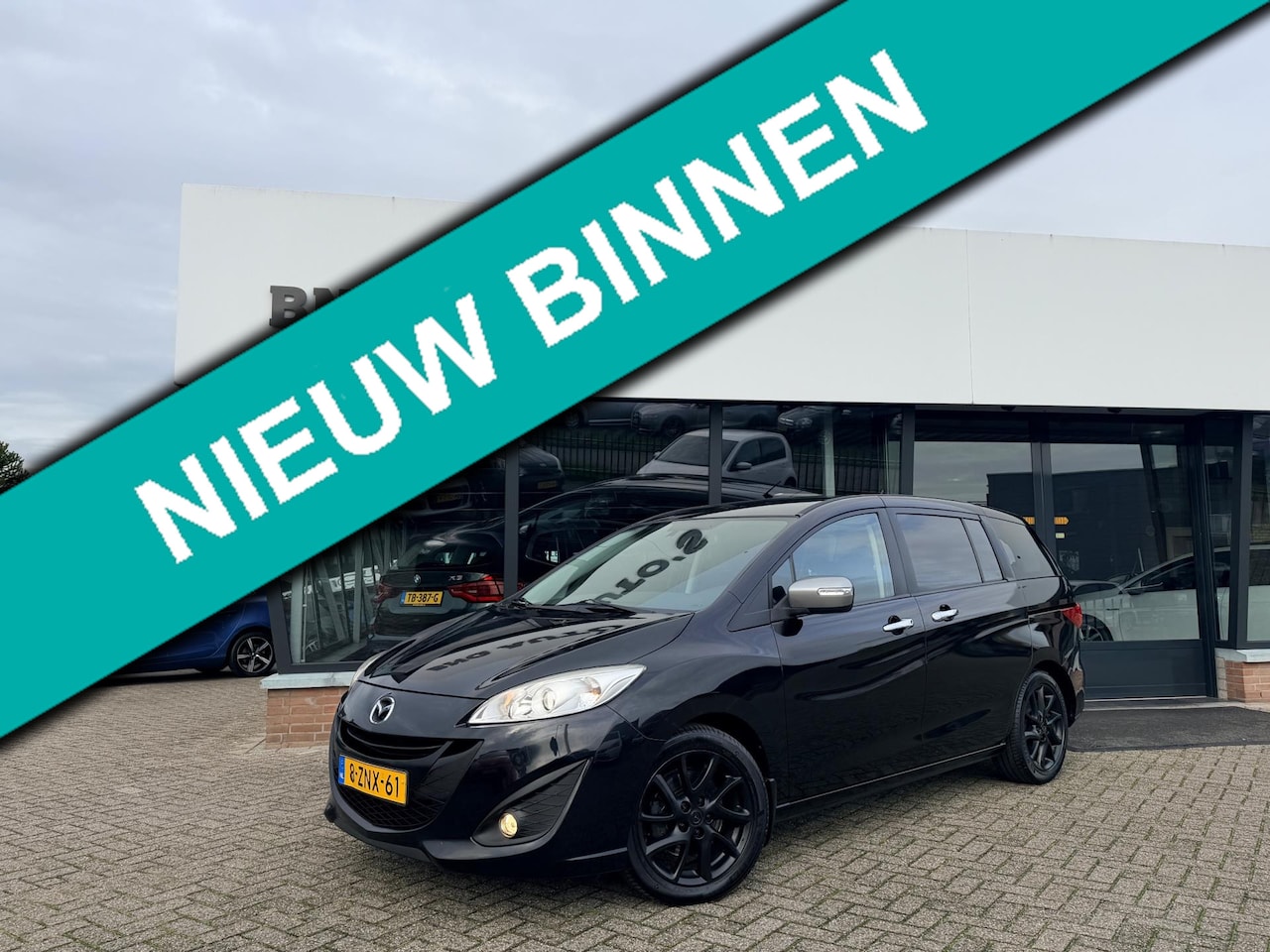 Mazda 5 - 2.0 Silver Edition 7per_AC_Cruise_AchterCamera. - AutoWereld.nl