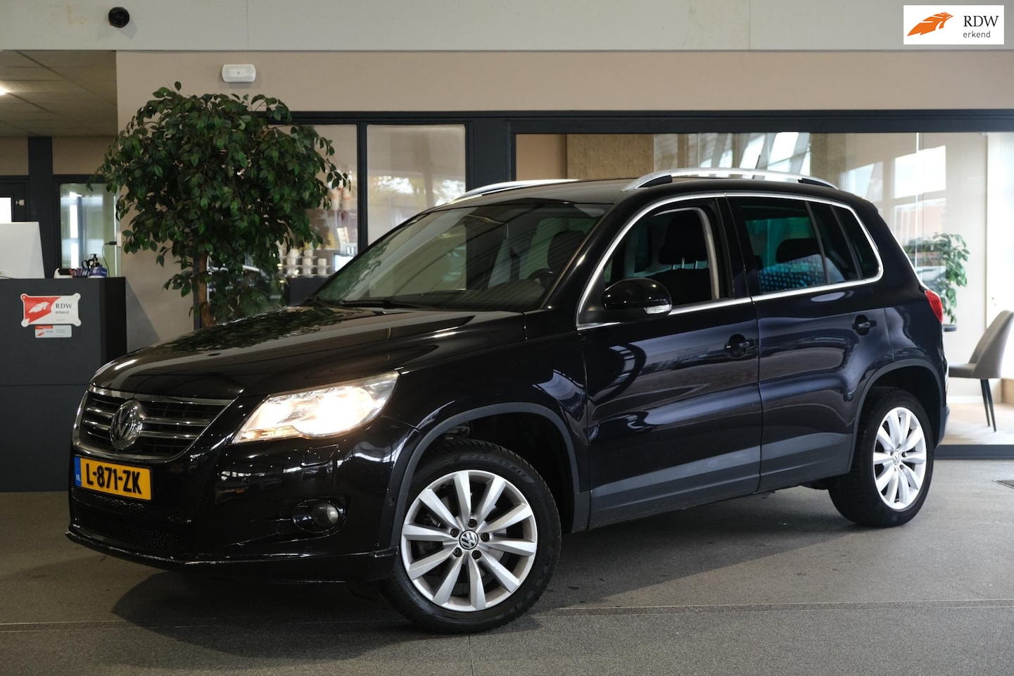 Volkswagen Tiguan - 1.4 TSI Easyline Cruise PDC Radio Stoelverwarming Trekhaak - AutoWereld.nl