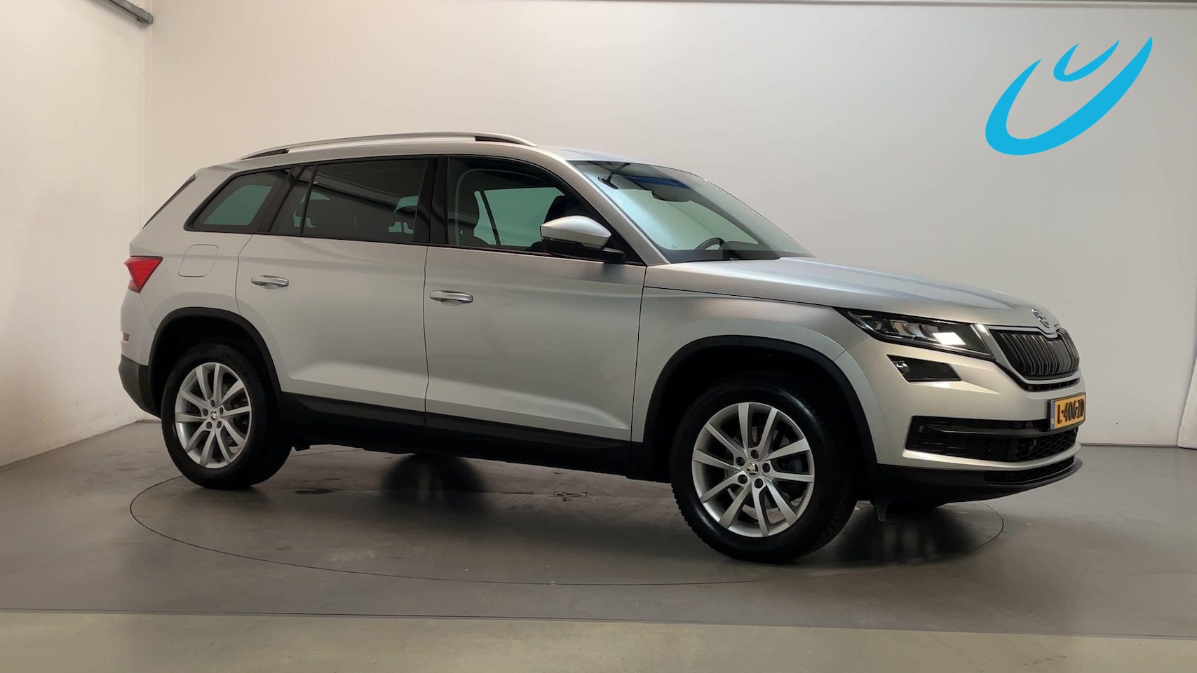 Skoda Kodiaq - 1.5 TSI 150pk DSG Business Edition Leder-Stof Camera Navigatie Sfeerverlichting - AutoWereld.nl