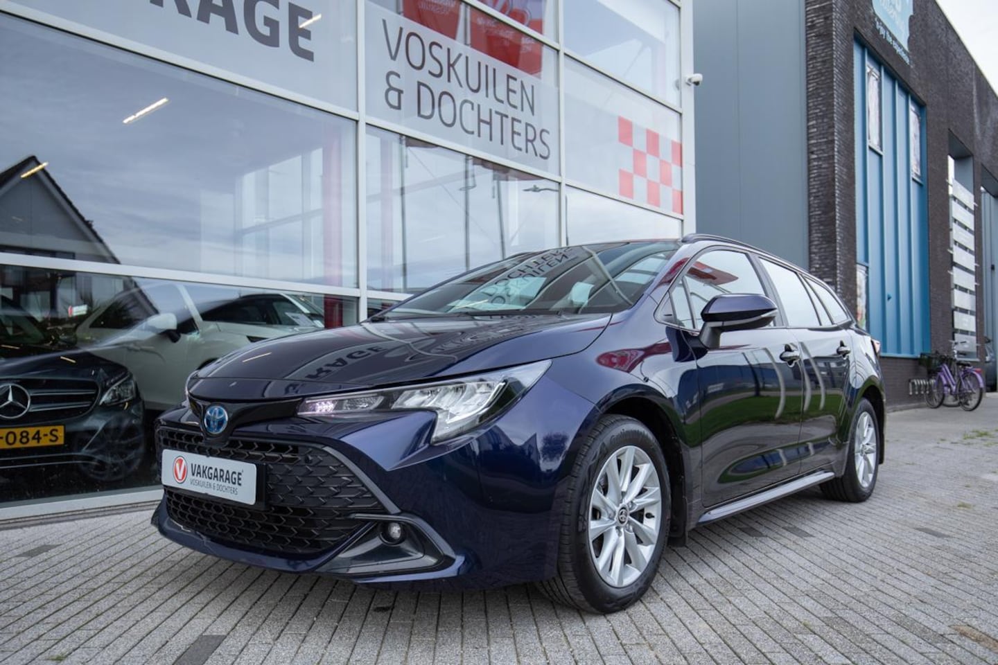 Toyota Corolla Touring Sports - 1.8 Hybrid Active MY23 | Stoelverwarming |carplay - AutoWereld.nl
