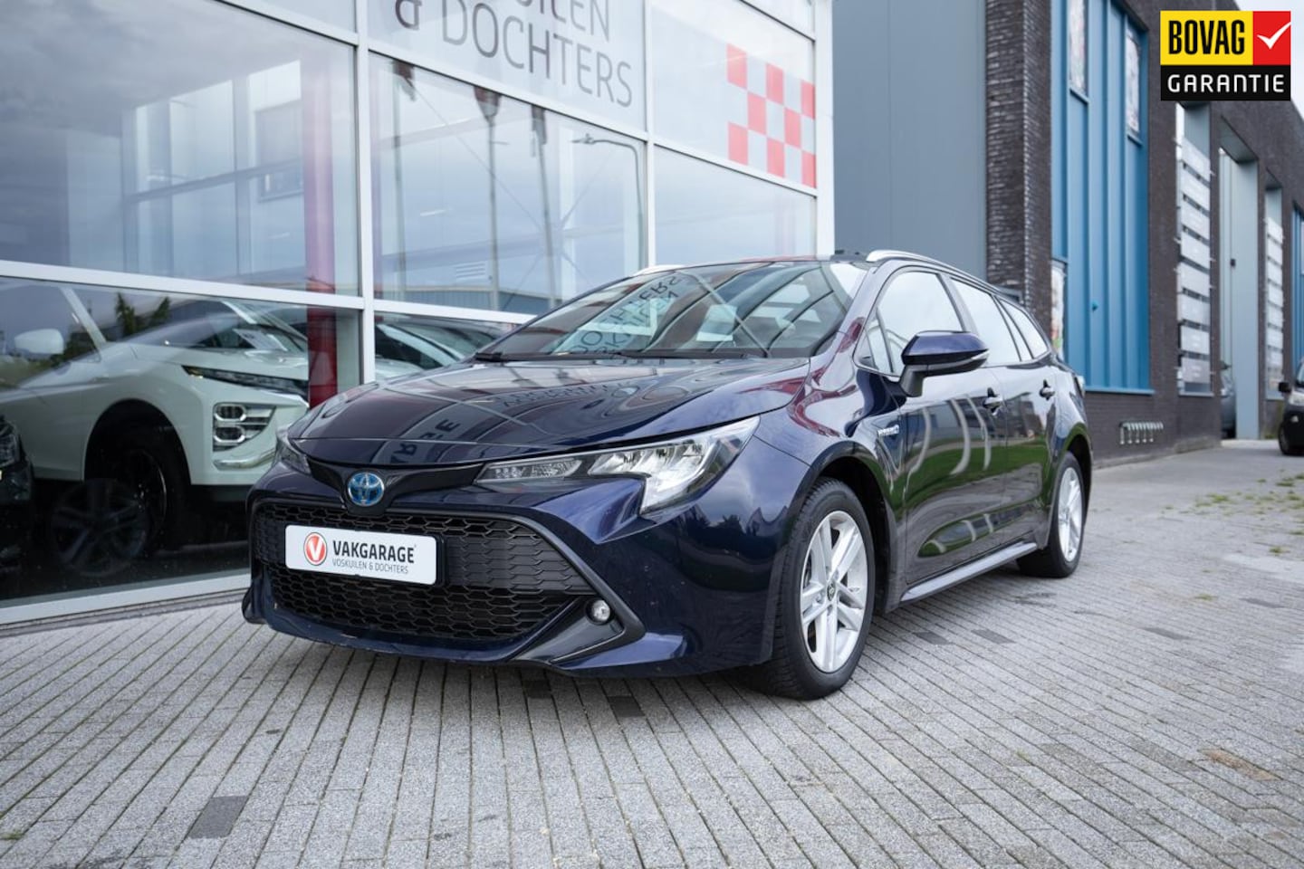 Toyota Corolla Touring Sports - 1.8 Hybrid Active Carplay | Camera |stoelverwarming - AutoWereld.nl