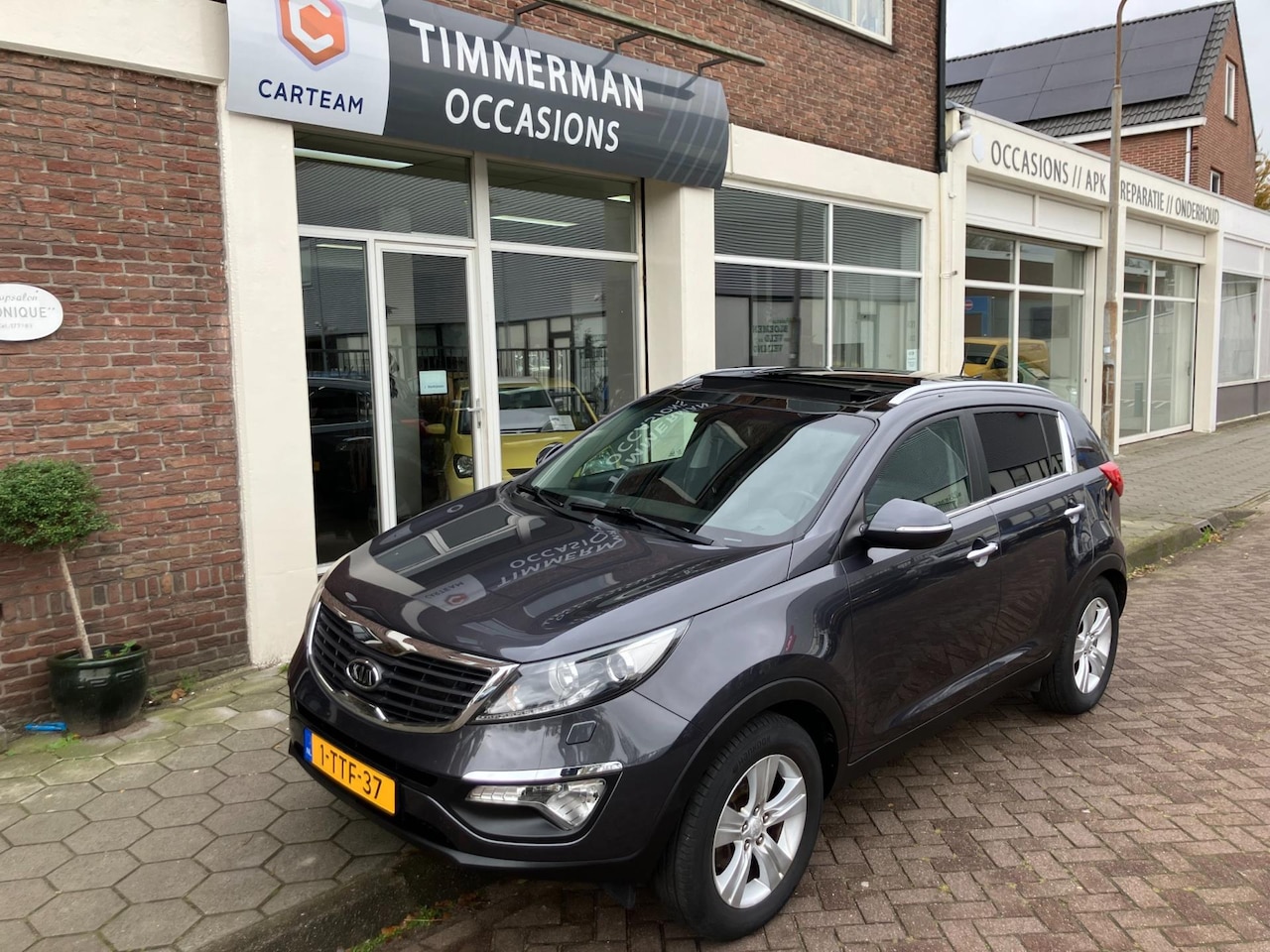 Kia Sportage - 1.6 GDI ISG X-ecutive Plus Pack|Pano|Trekhaak|Navigatie - AutoWereld.nl