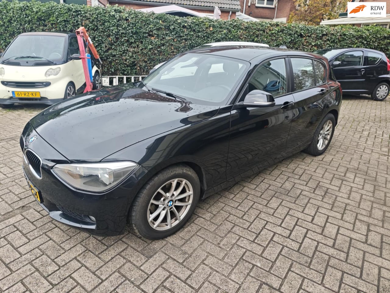 BMW 1-serie - 116i Business- Stoelverwarming-Cruise-Parksensor-Nieuwe APK. - AutoWereld.nl