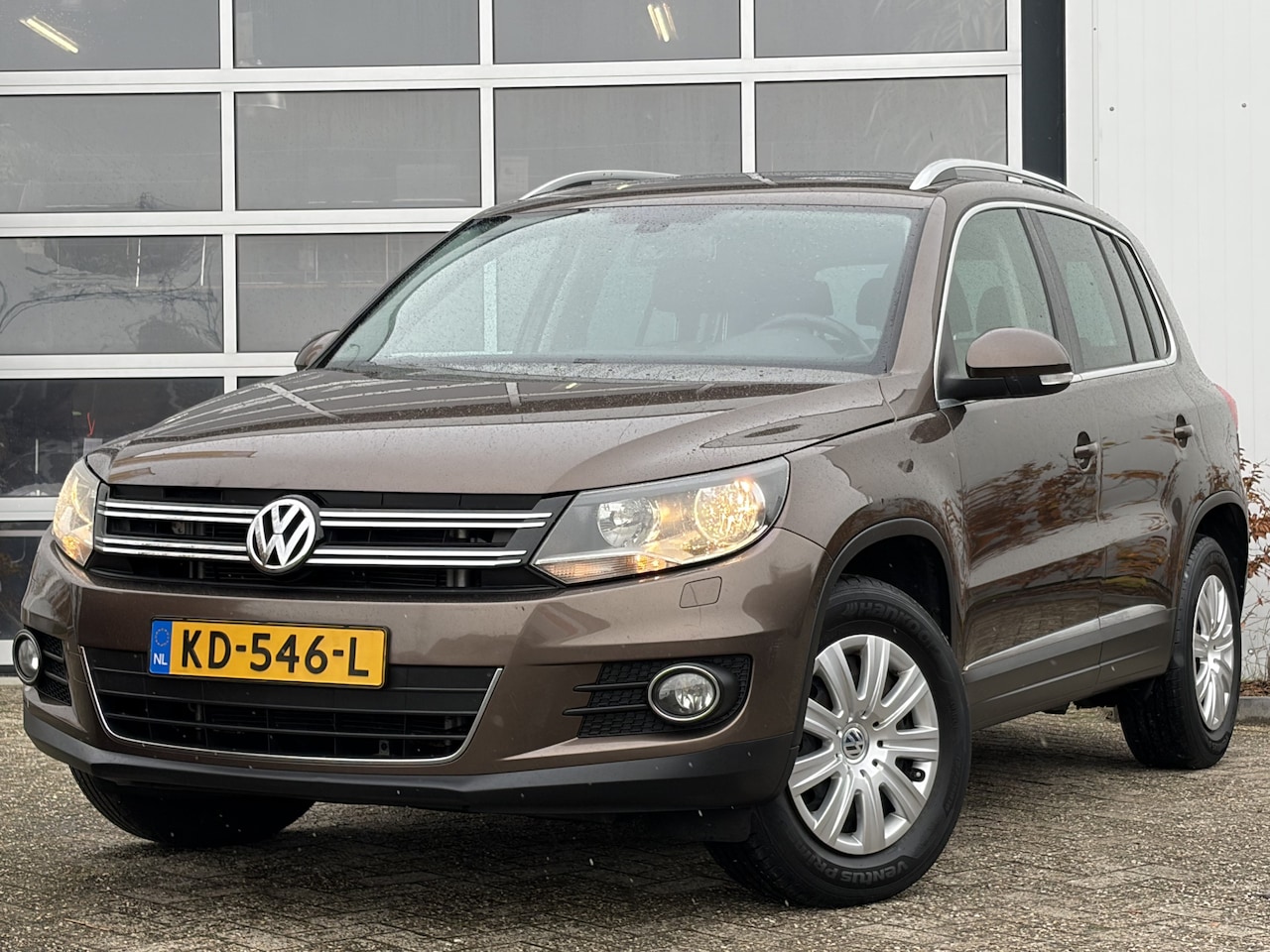 Volkswagen Tiguan - 1.4 TSI Sport&Style 122PK | Airco automatisch | Cruise control | Elektrisch glazen panoram - AutoWereld.nl