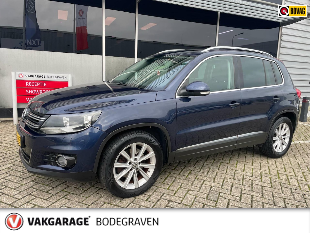 Volkswagen Tiguan - 1.4 TSI Sport&Style - AutoWereld.nl