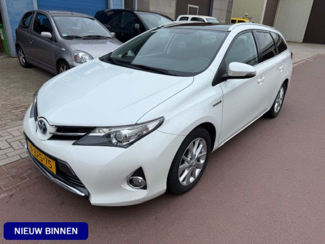 Toyota Auris Touring Sports - 1.8 Hybrid Lease dec-2014 Panoramadak Camera Navigatie Zeer goede auto met 100% Toyota dea - AutoWereld.nl