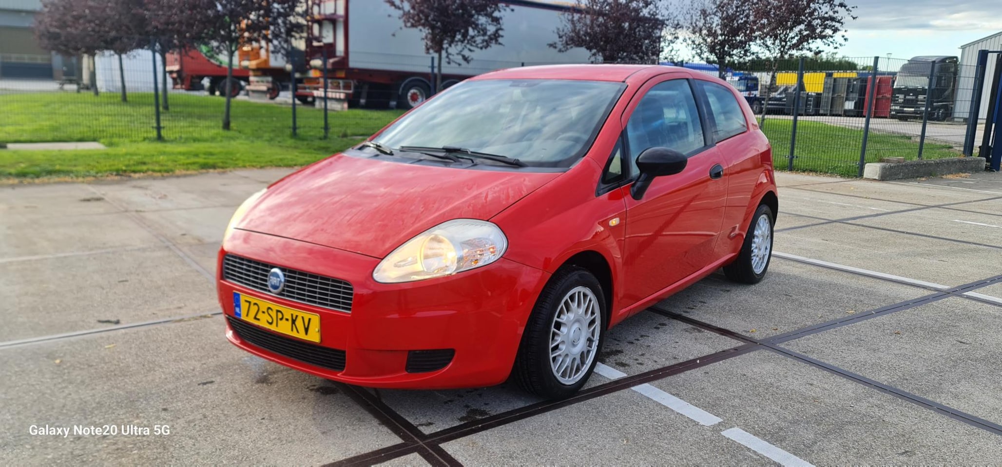 Fiat Grande Punto - 1.2 Sportsound Fiat Punto 1.2i Airco 1jr APK inruil + garantie - AutoWereld.nl