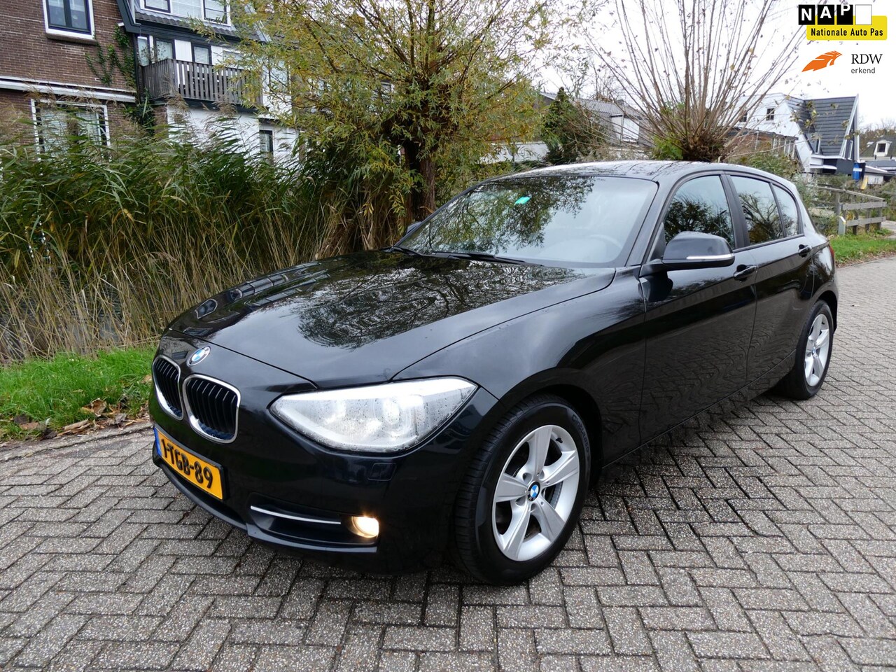 BMW 1-serie - 114i Exe 5-deurs 158.000km. 102pk Clima Cruise Navi Xenon PDC - AutoWereld.nl