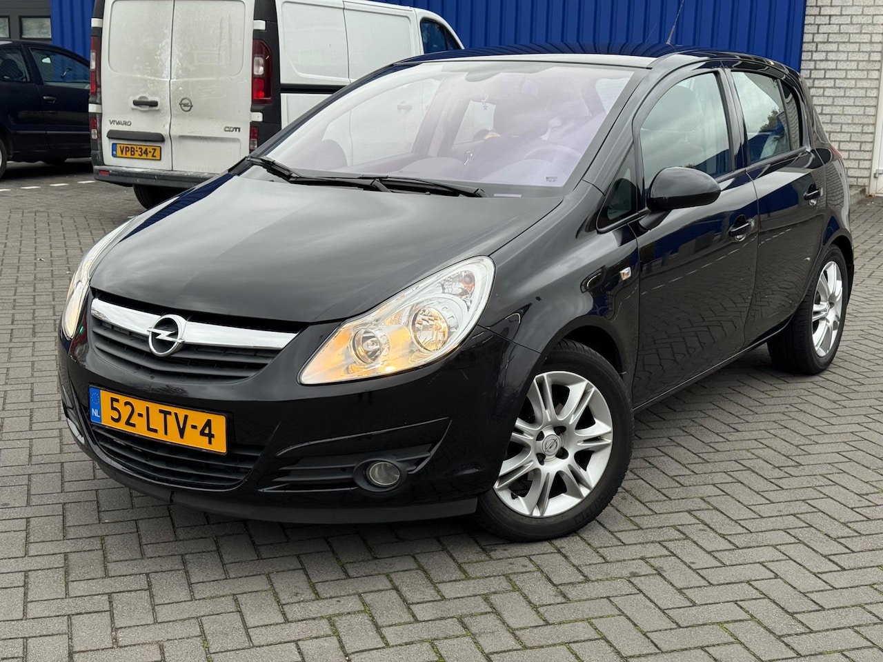 Opel Corsa - 1.4-16V Cosmo/Automaat/Airco/Cruise/Leer/LMV/PDC/NAP - AutoWereld.nl