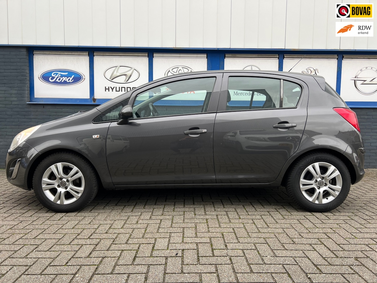 Opel Corsa - 1.2-16V 5drs.airco Anniversary Edition 2012 3995eu - AutoWereld.nl