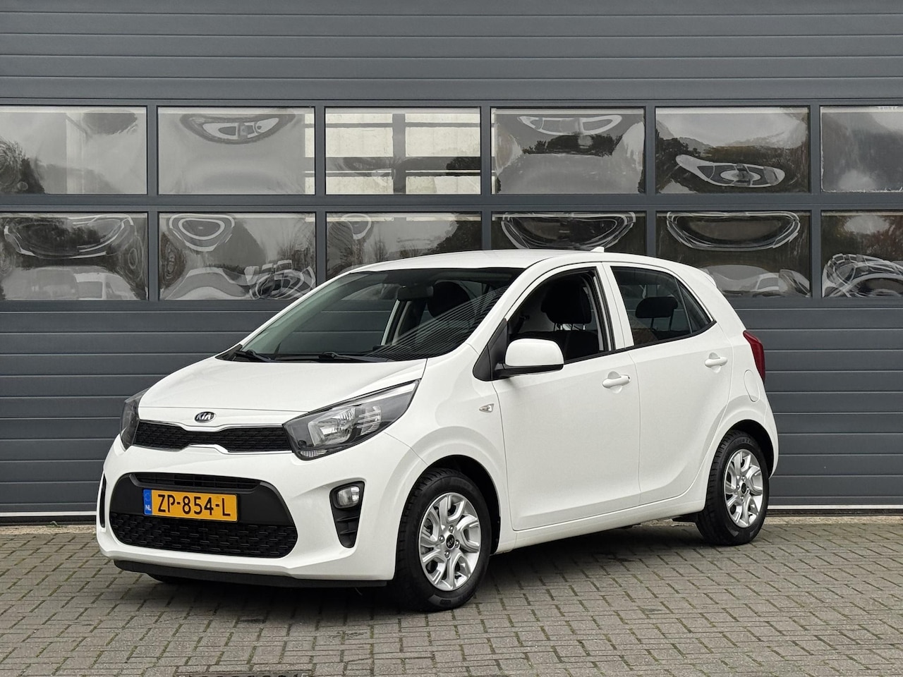 Kia Picanto - 1.0 MPI DYNAMICLINE I APPLE CARPLAY I P-CAMERA I UNIEKE KM-STAND I LICHT METALEN VELGEN - AutoWereld.nl