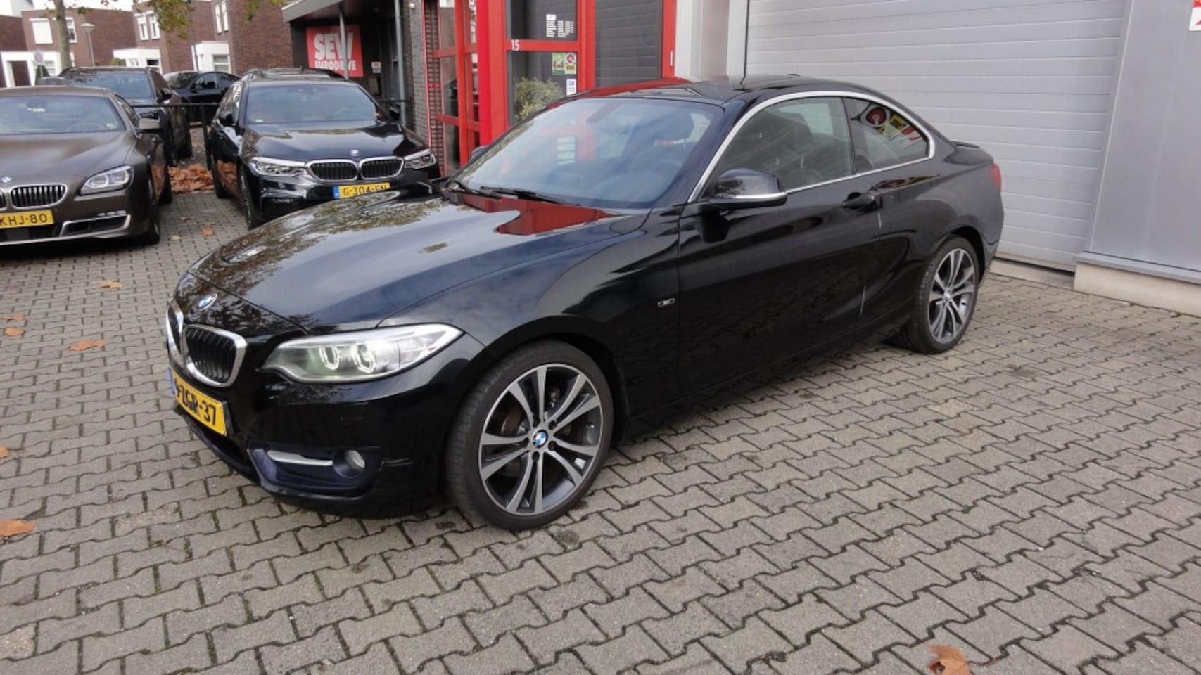 BMW 2-Serie - 220i High Executive. - AutoWereld.nl