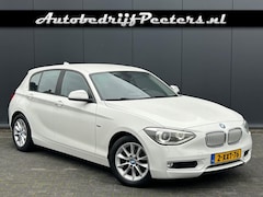 BMW 1-serie - 116d 2e eigenaar H/K Navi Leder Sportstoel Xenon M-stuur NL-auto
