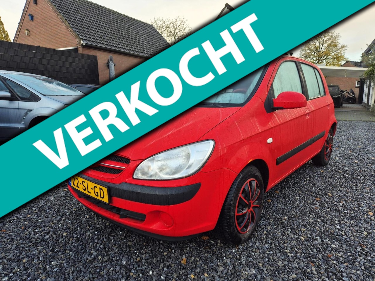 Hyundai Getz - 1.1i Active Young 5 Drs 1e Eig deuk in a scherm - AutoWereld.nl