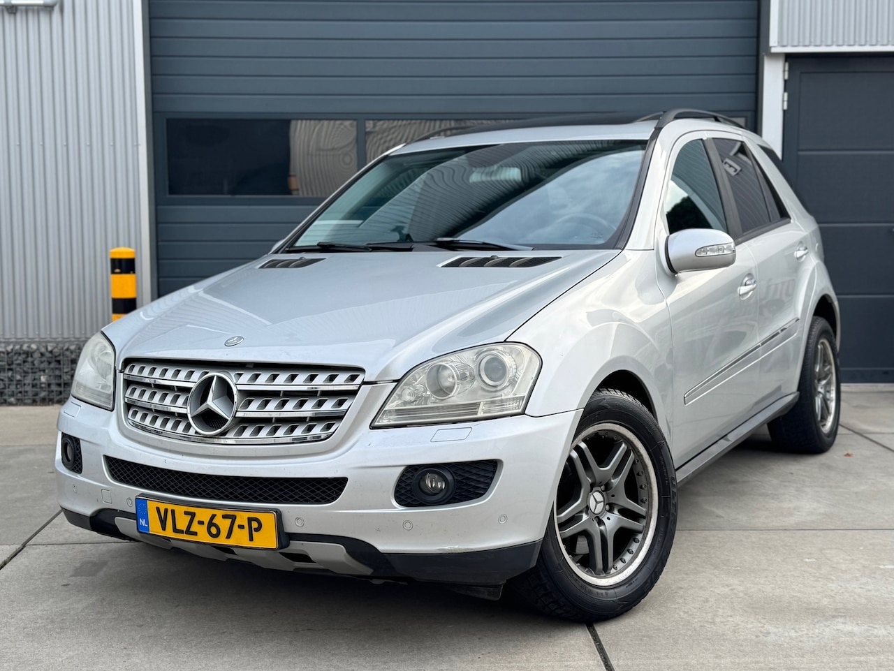 Mercedes-Benz ML-klasse - 320 CDI GRIJS KENTEKEN AUT / CLIMA / CRUISE - AutoWereld.nl