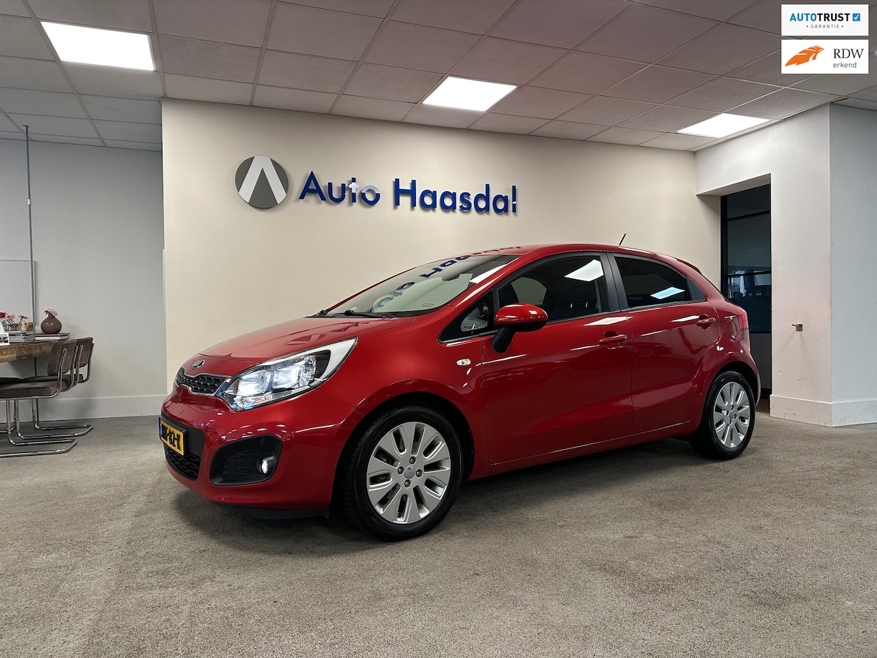 Kia Rio - 1.4 CVVT|109PK|CAMERA|NAVI|BLUETOOTH|16"|STOELVERWARMING - AutoWereld.nl
