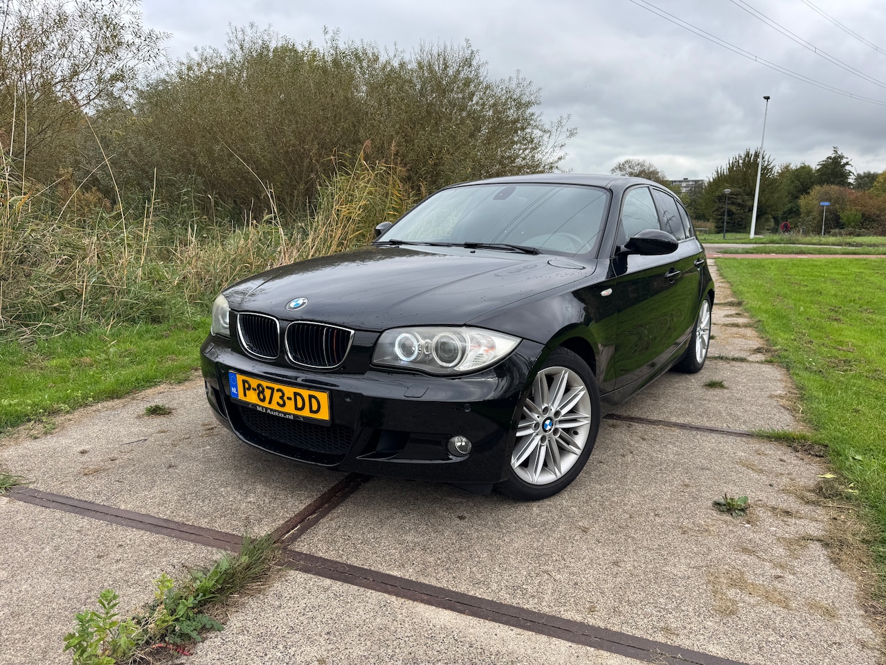 BMW 1-serie - 118i High Executive M-pakket|PDC|Leder|Xenon|Facelift|Top onderhouden - AutoWereld.nl