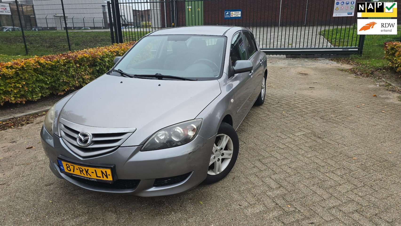 Mazda 3 Sport - 1.4 Touring AIRCO NAP LAGE KM!! - AutoWereld.nl