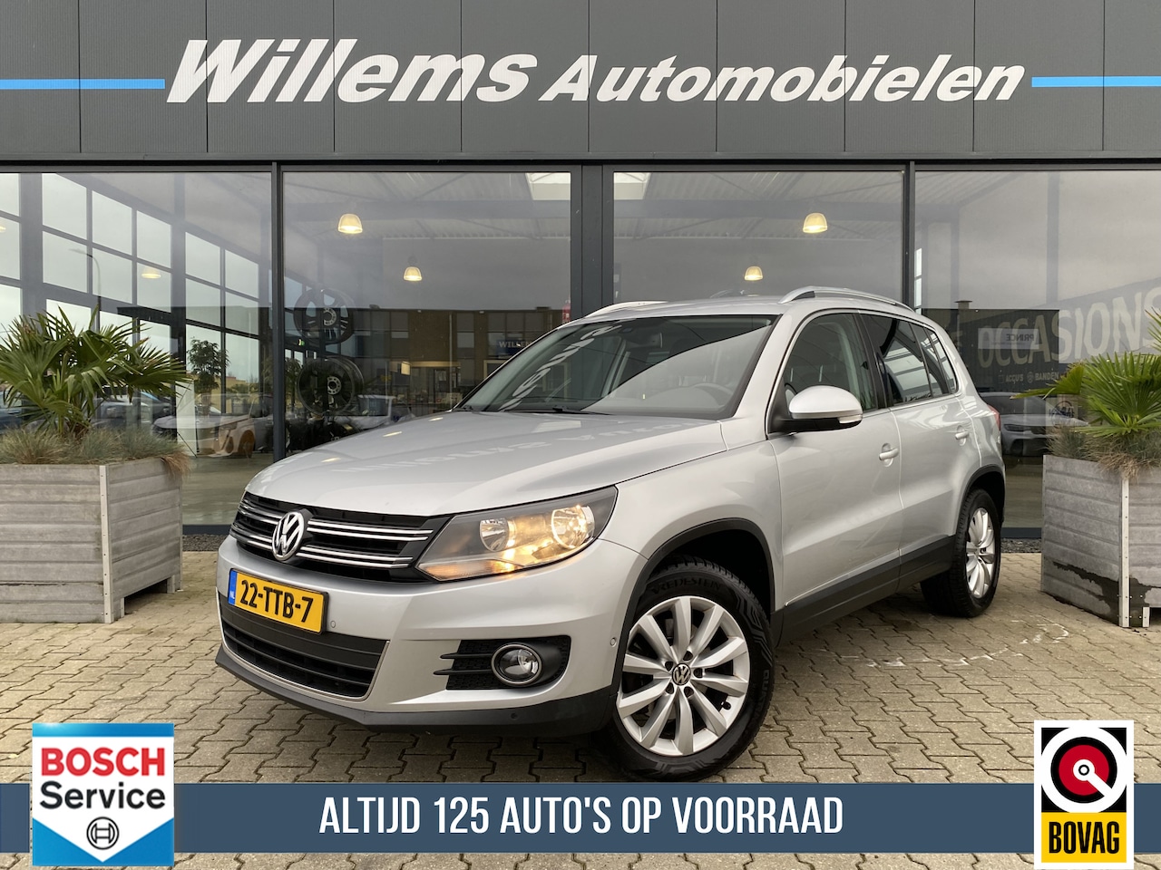 Volkswagen Tiguan - 1.4 TSI Sport&Style Trekhaak, Navigatie - AutoWereld.nl